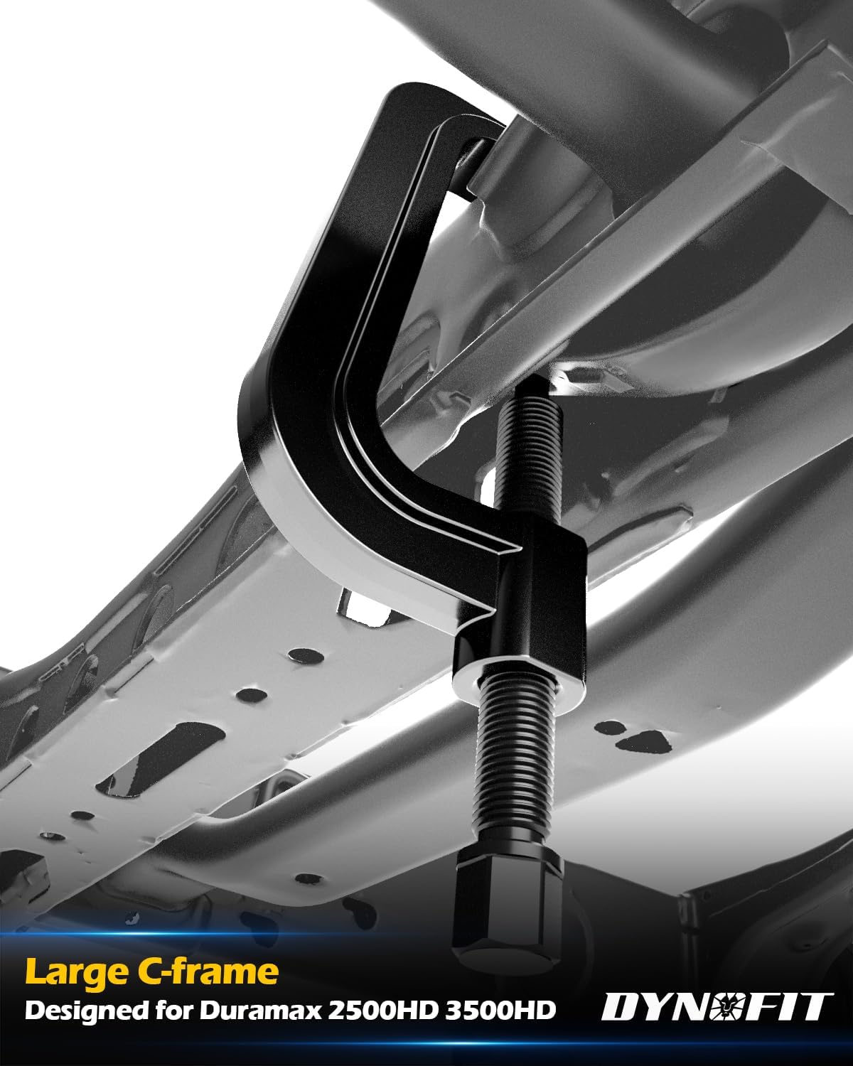 Large C-frame torsion key removal tool installed on Duramax 2500HD 3500HD undercarriage for unloading.