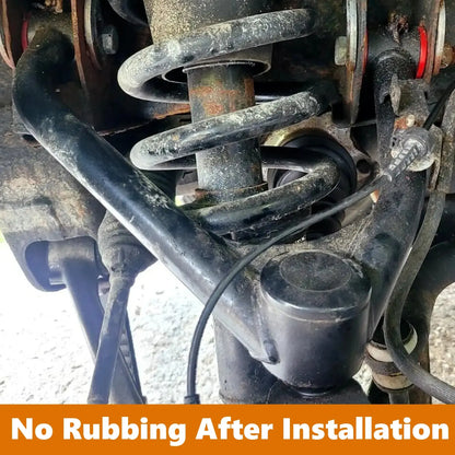 Close-up of vehicle suspension system with Dynofit branding and text 'No Rubbing After Installation'.