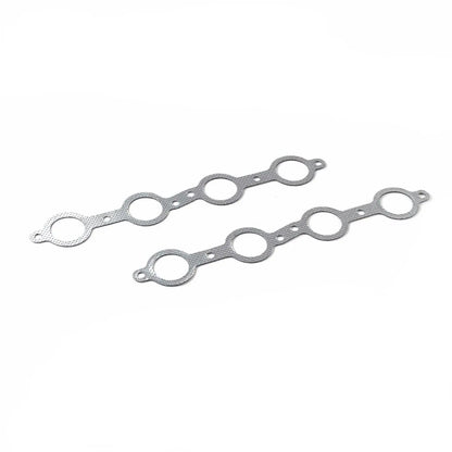 Stainless steel exhaust header gaskets with multiple circular cutouts, designed for sealing 1964-1973 Chevy Chevelle V8 engines.