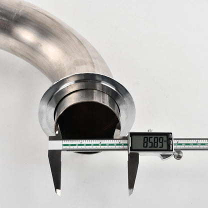 Digital caliper measuring the downpipe’s diameter (87.04mm outer, 85.89mm inner, 15.2mm flange thickness) for precise fitment on 2017-2023 Chevy Silverado/GMC Sierra L5P 6.6L.